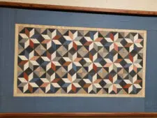Inlaid wood quilt hanging